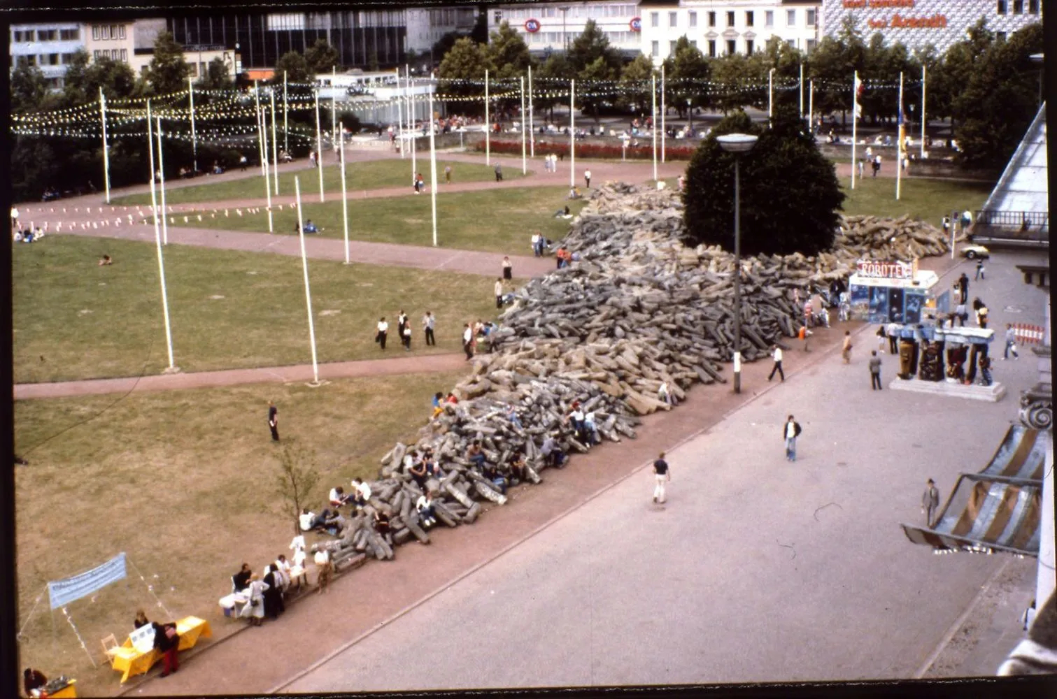 Joseph Beuys during Documenta 7 in 1982 explaining his project 7000 oaks