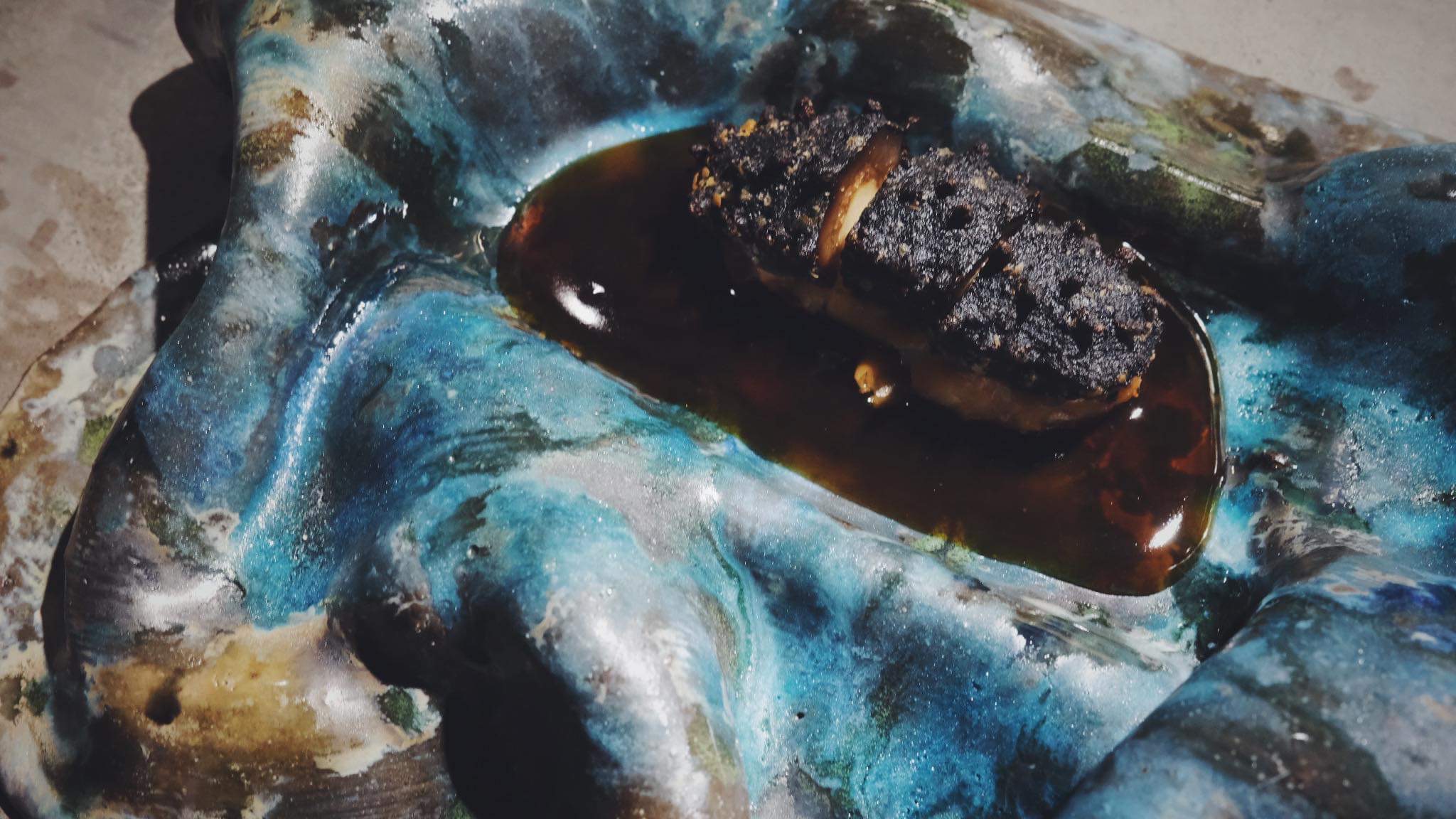 Crispy Sea Cucumber stuffed with sea bream fish cake photo by 成導 plates by Evans Kao